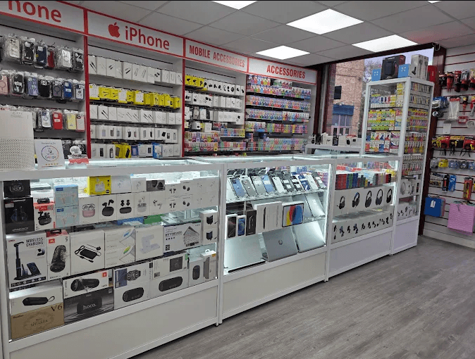 Greenwich Gadgets interior — phone cases and accessory display cabinets